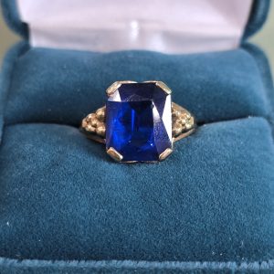 Estate Flower Accented Blue Sapphire Ring