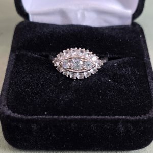 Estate Marquise Halo Three-Stone Ring