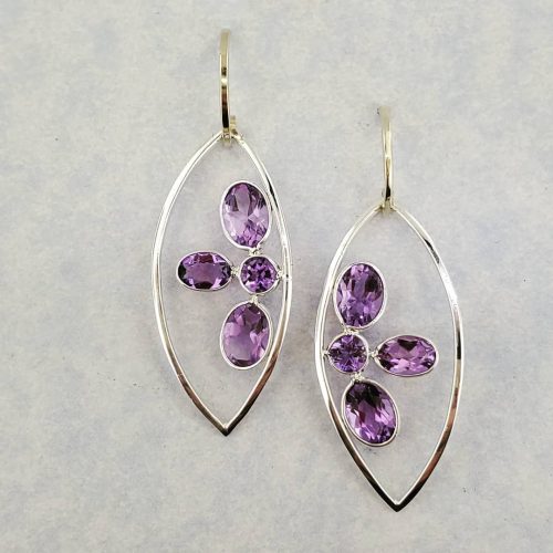 Amethyst clusters in 14k yellow gold open shape dangle earrings.