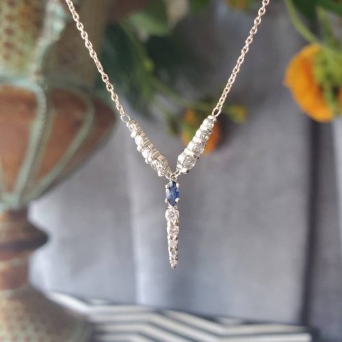 Y-shaped diamond and sapphire wedding day necklace in 14k white gold.