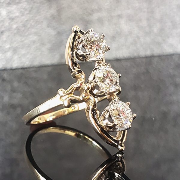 Three diamond stacked ring with filagree details in 14k yellow gold.