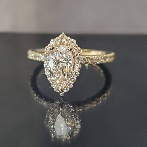 Open 14k white gold band with diamond accents and bezel set family stones.
