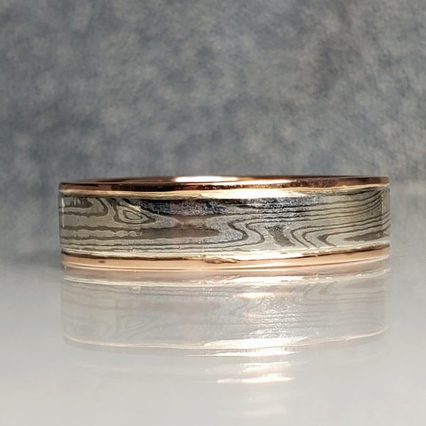 Inlay palladium and silver Mokume Gane with 14k rose gold Edge men's Wedding Band. Created by Katherine Spencer in Morgantown, West Virginia, USA