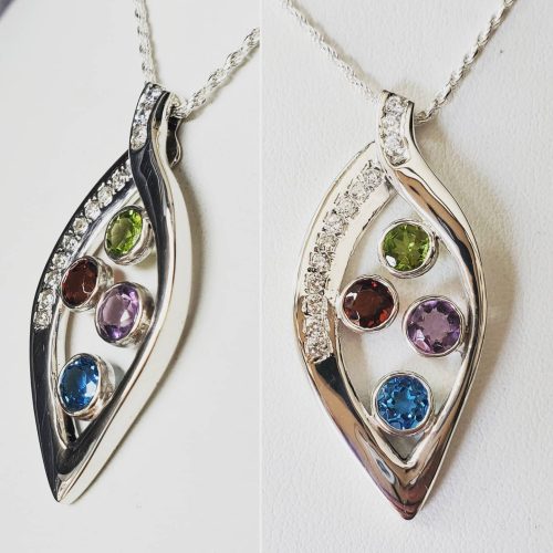 14k white gold sapphire and diamond contour wedding band. 14k white gold necklace with blue sapphires leading to a round diamond with a pear shape diamond dangle.