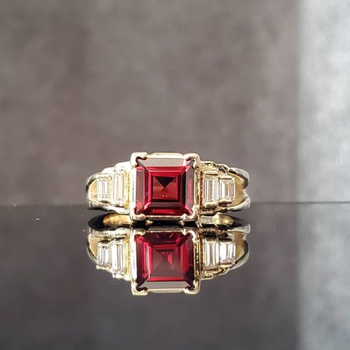 14k white gold three row diamond cathedral band set with a rare oval Padparadscha sapphire