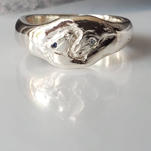 Alternative style engagement ring with a hexagon salt and pepper diamond and marquise diamonds set in 14k yellow gold. Made by Katherine Spencer in Morgantown, West Virginia USA