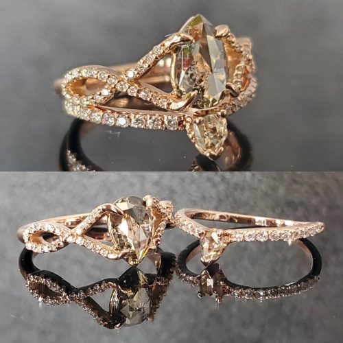 Nature inspired engagement ring. 14k white gold leaf and vine style two stone ring with bezel set blue diamonds and white diamond accents. Made by Katherine Spencer in Morgantown, West Virginia USA
