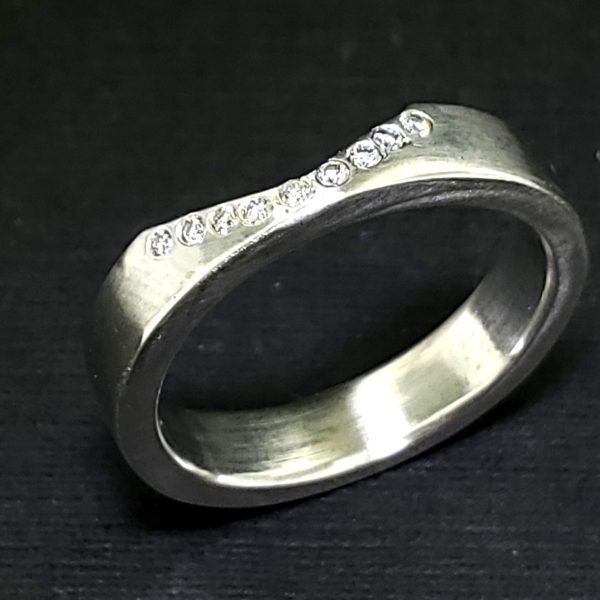 Illusion Contour diamond Wedding Band in platinum. Created by Katherine Spencer in Morgantown, West Virginia, USA
