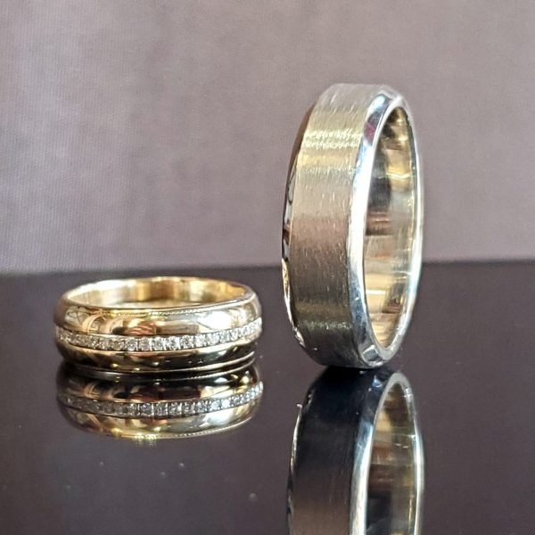 repurposed ladies wedding band and beveled edge men's wedding band in 14k white gold. Created by Katherine Spencer in Morgantown, West Virginia, USA