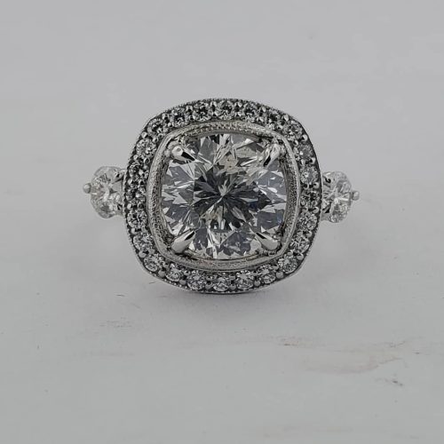 14k yellow wide band with multiple bezel and flush set diamonds