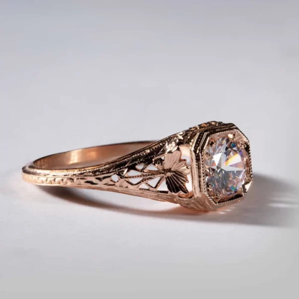 The open and delicate filigree of Palm, Wheat and Running Scrolls in this vintage 1920's filigree ring holding a 6mm gemstone symbolize fulfillment, everlasting prosperity, and renewal.